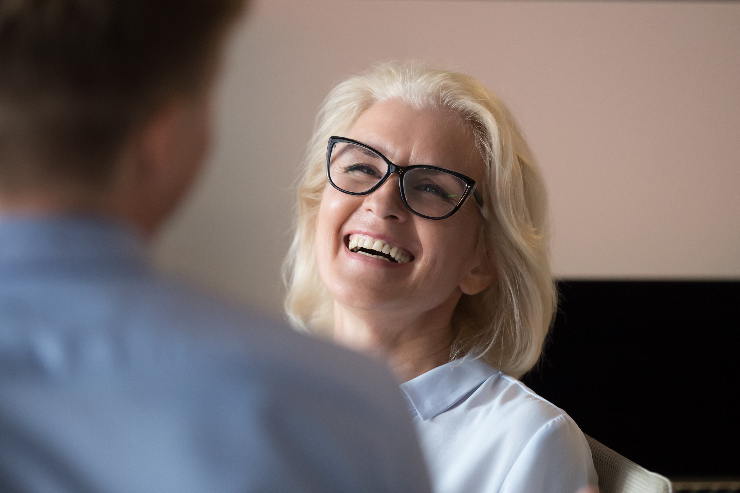 Lady laughing enjoying her job workshop