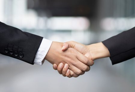 Low cost outplacement - shaking hands
